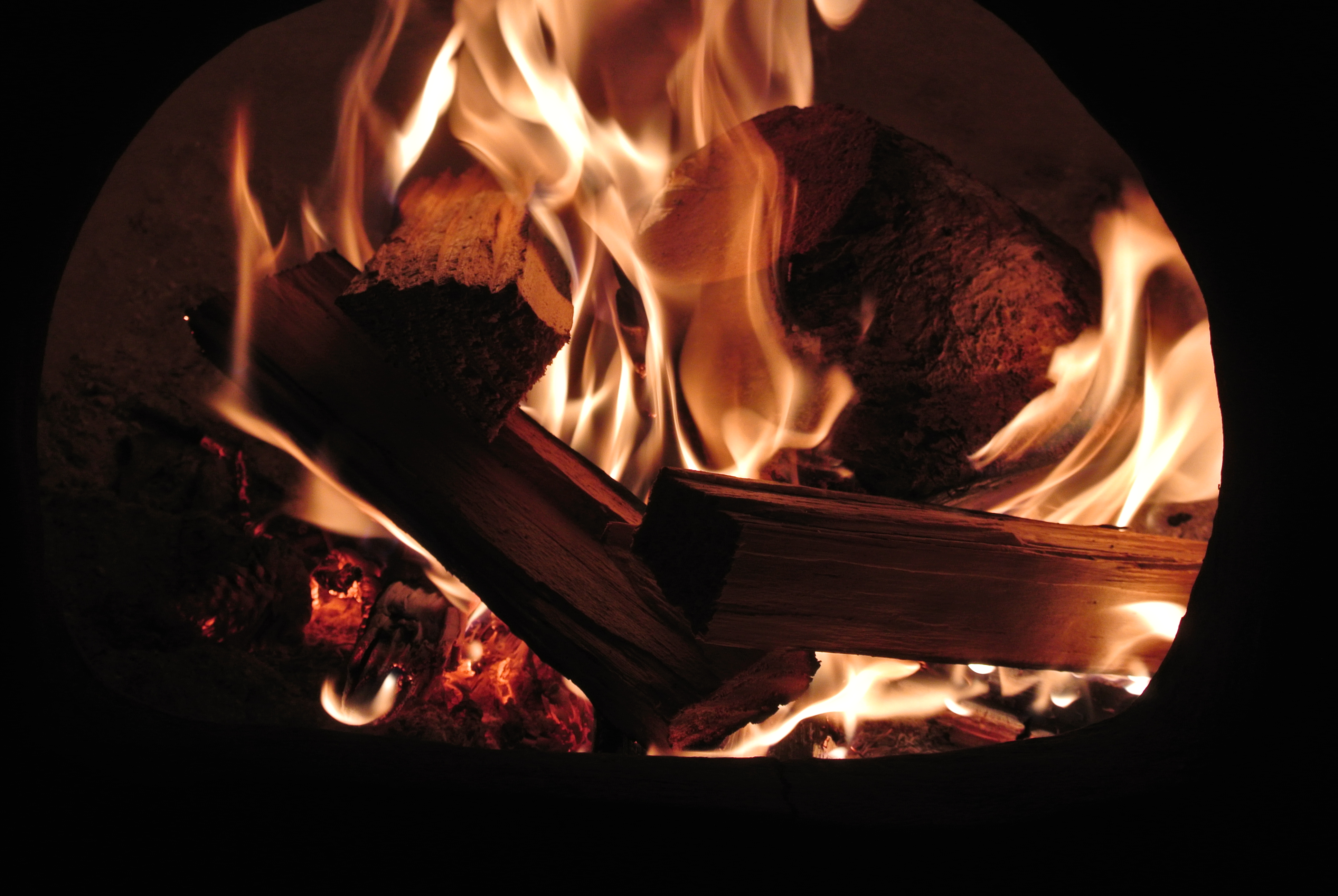 The longer you sit the more the fire draws you into the swirling and dancing flames, Photos can never quite capture the glow of the embers.....I love the warmth radiating out of the mouth.