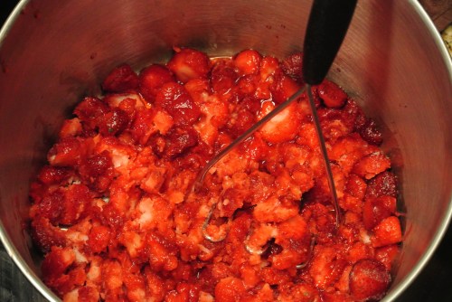 Gently mashing the berries for the "chunky" jam.