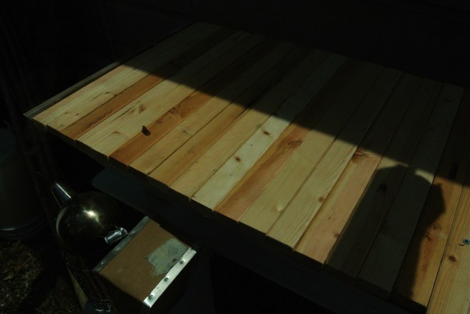 The bars fit flush across the top made of standard 1X2 lumber so replacement parts won't be a problem.