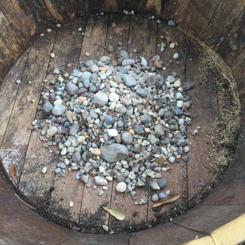 I piled a small bucket load of gravel over the hole to aid in retention of the garden soil.....I suspect it will work well.